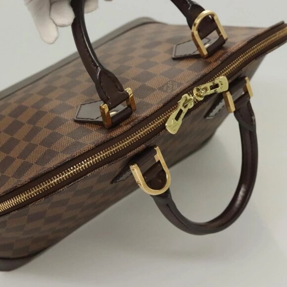 LOUIS VUITTON Damier Ebene Alma Hand Bag - Picture 6 of 15
